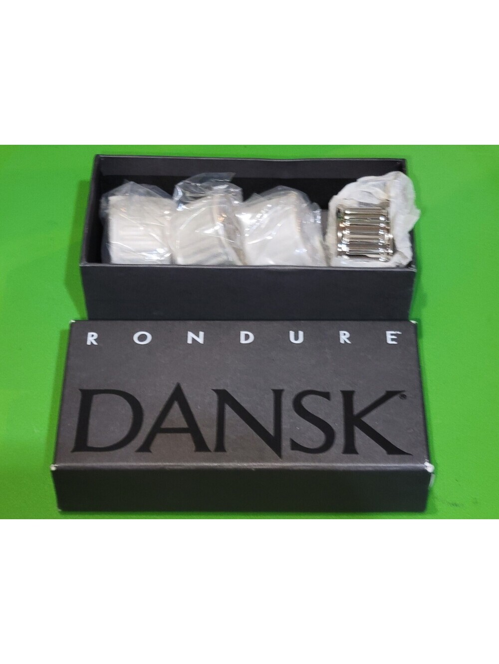 DANSK RONDURE SILVER TONED NAPKIN RINGS ~ SET OF 4